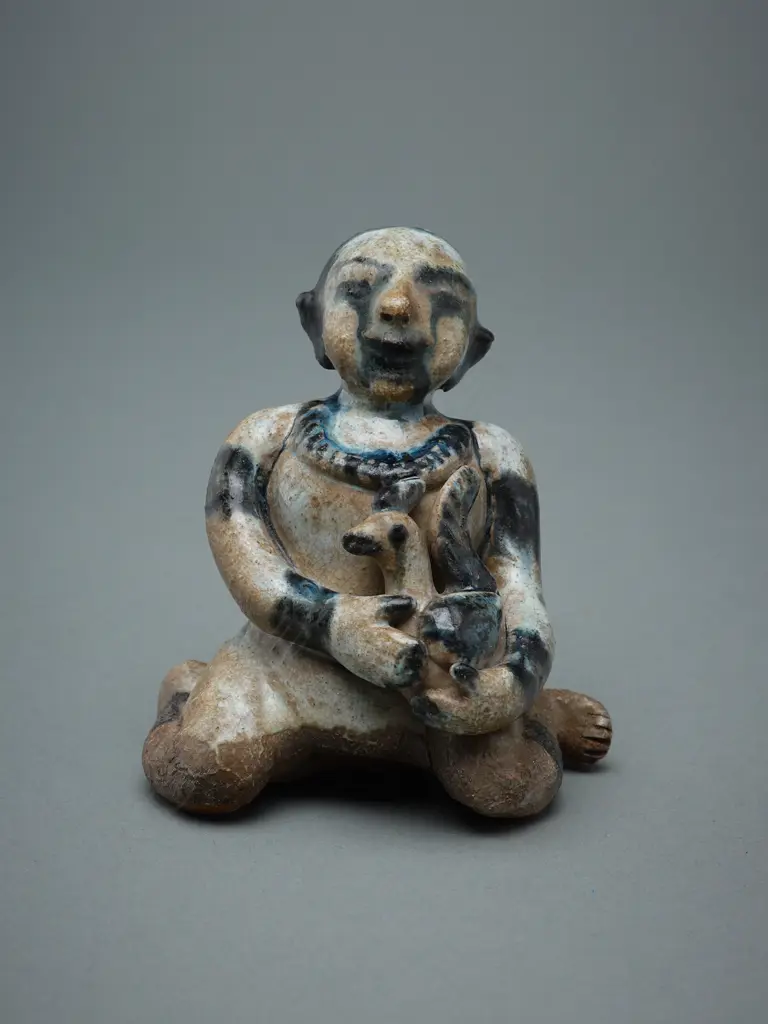 A Sawankhalok stoneware figure (tukatha), Image 1++
